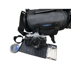 Olympus OM-10 35mm SLR Film Camera w/ Zuiko 50mm f/1.4 Lens Case Bag Hood Extras